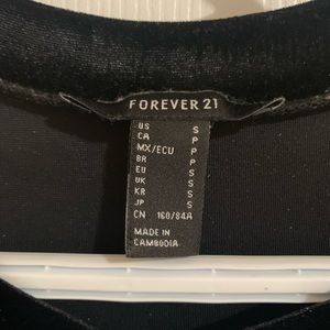 Black velvet oversized tshirt.